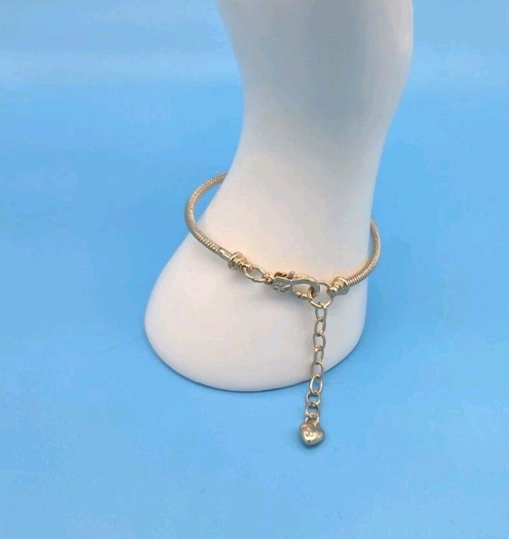 2 European style Gold bracelets one adjustable and one with a magnetic clasp7.5"